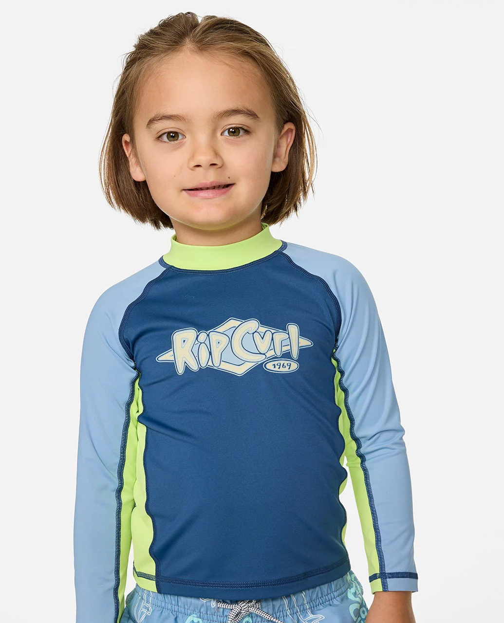 12024-ride-the-wave-upf-long-sleeve-rash-vest-kids-1.webp Ride The Wave UPF Long Sleeve Rash Vest - Kids